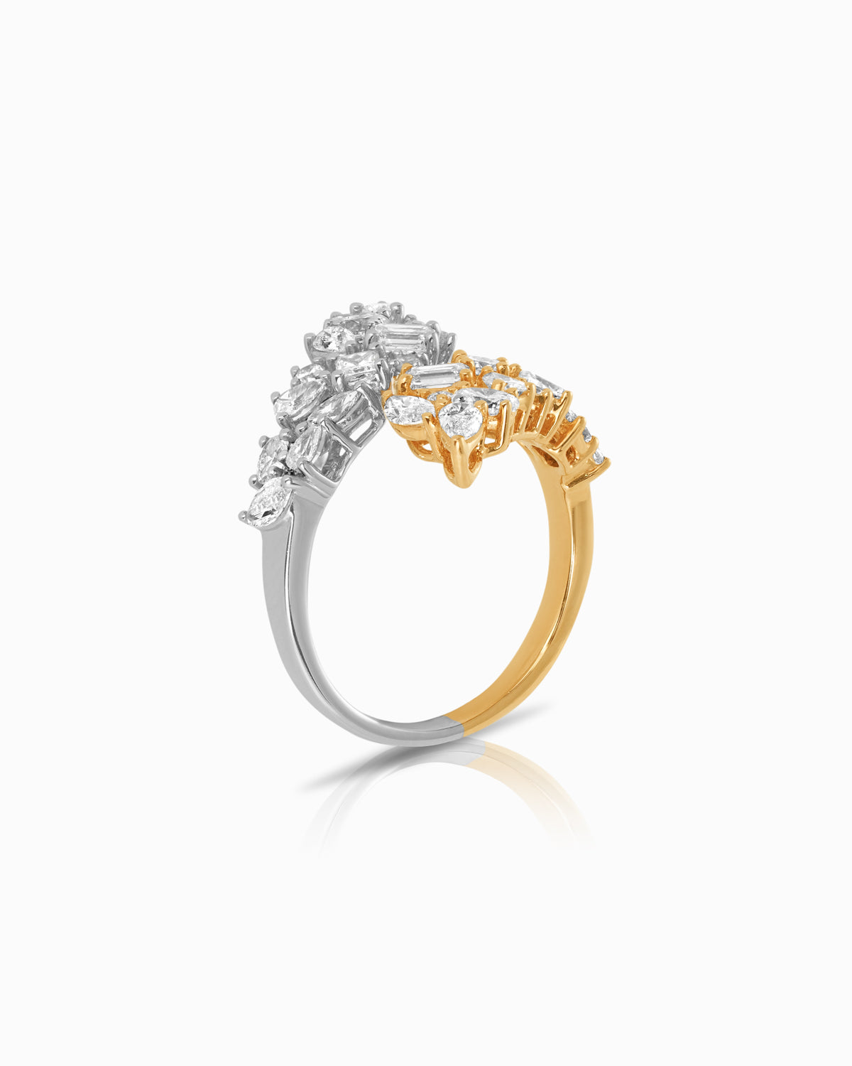 side view of 18k rose and white gold diamond ring with 1.95ct of marquise, pear, baguette, and round diamonds in a leaf-inspired open wrap design.
