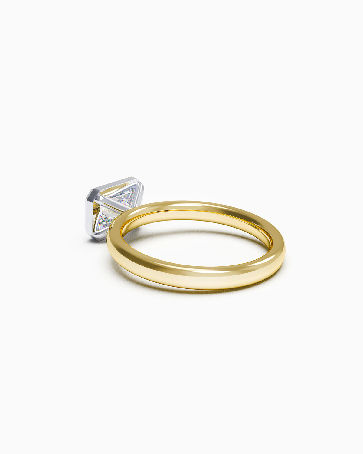 East-West Emerald Bezel Engagement Ring