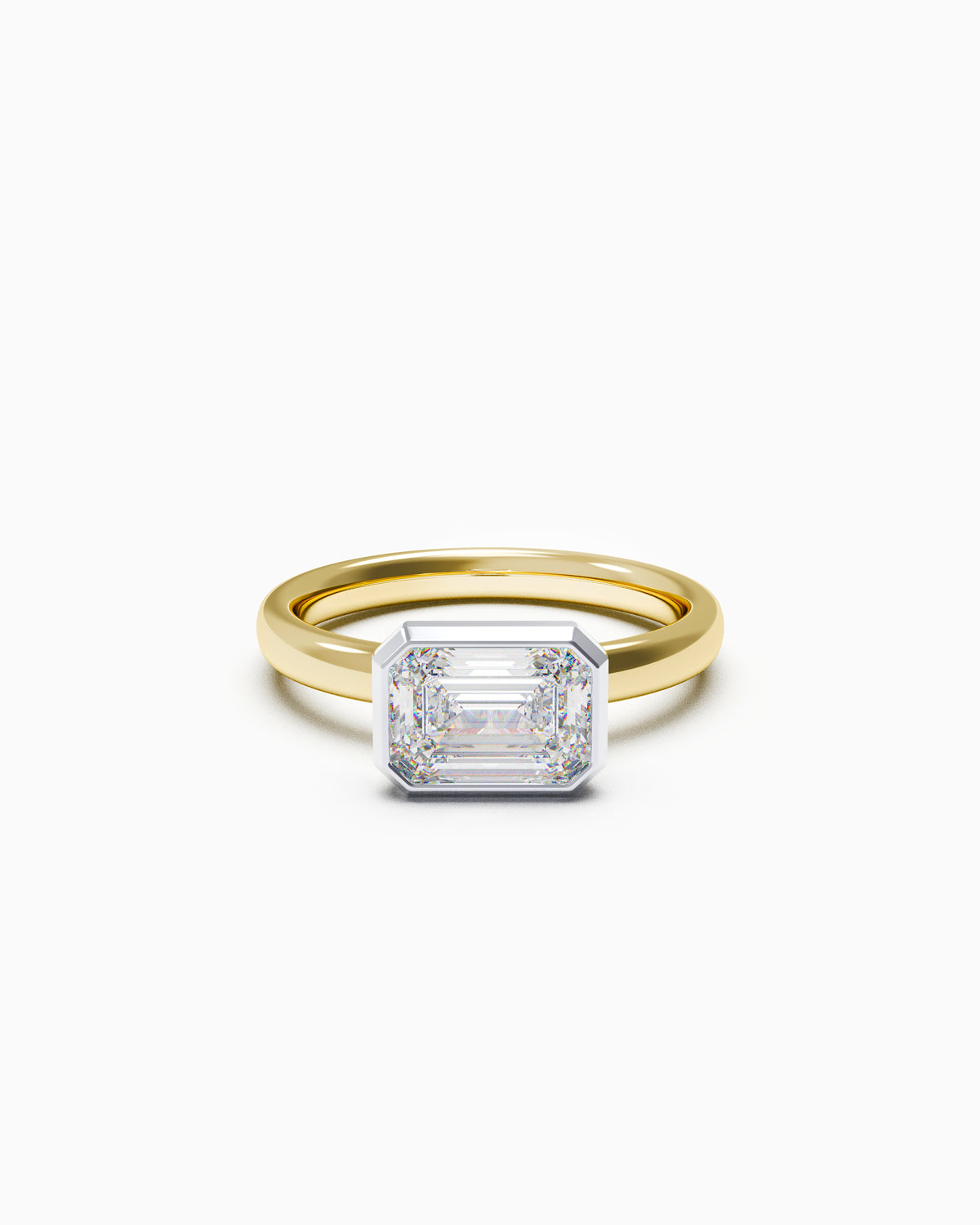 East-West Emerald Bezel Engagement Ring