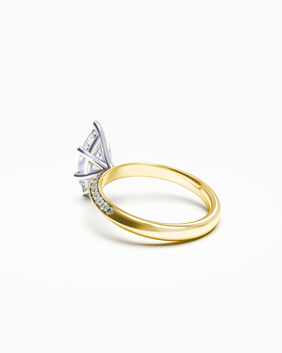 Side profile of a marquise diamond ring with pavé knife-edge band, highlighting the sharp taper and delicate elevation of the setting.