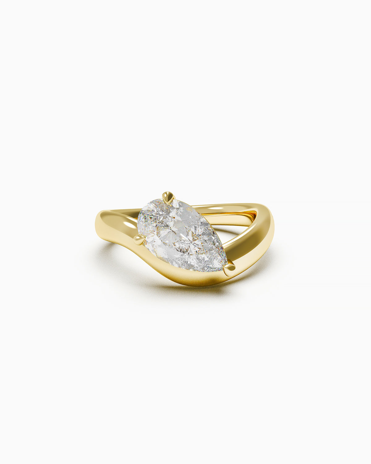 A yellow gold engagement ring with a pear-shaped diamond set in an organically curved band, photographed on a white background.