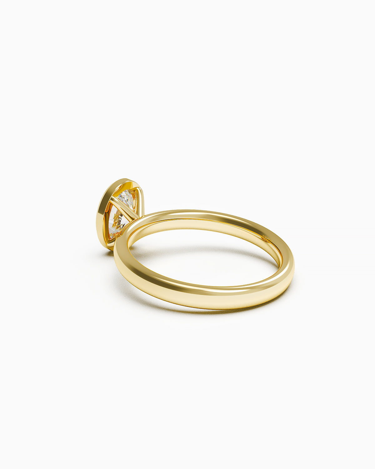 Side profile of an oval-cut bezel-set diamond ring with a smooth band, 18k gold