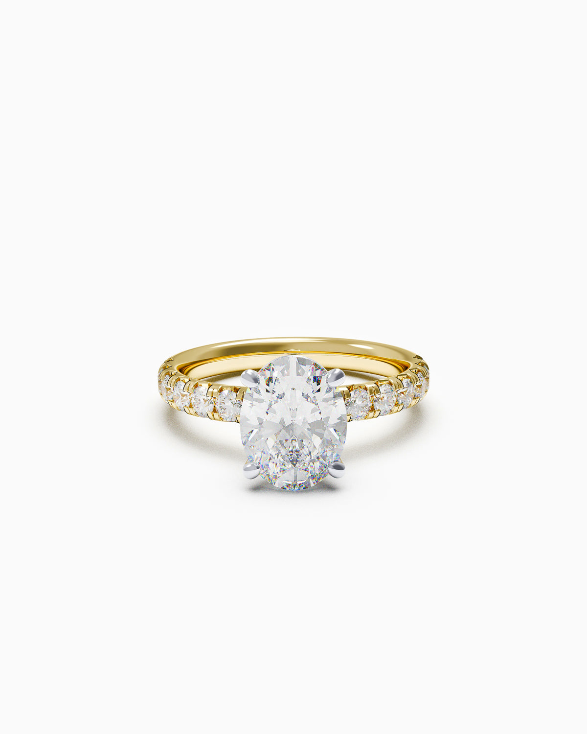 Oval-cut diamond engagement ring with a French-set diamond band in white or yellow gold, front view on white background.