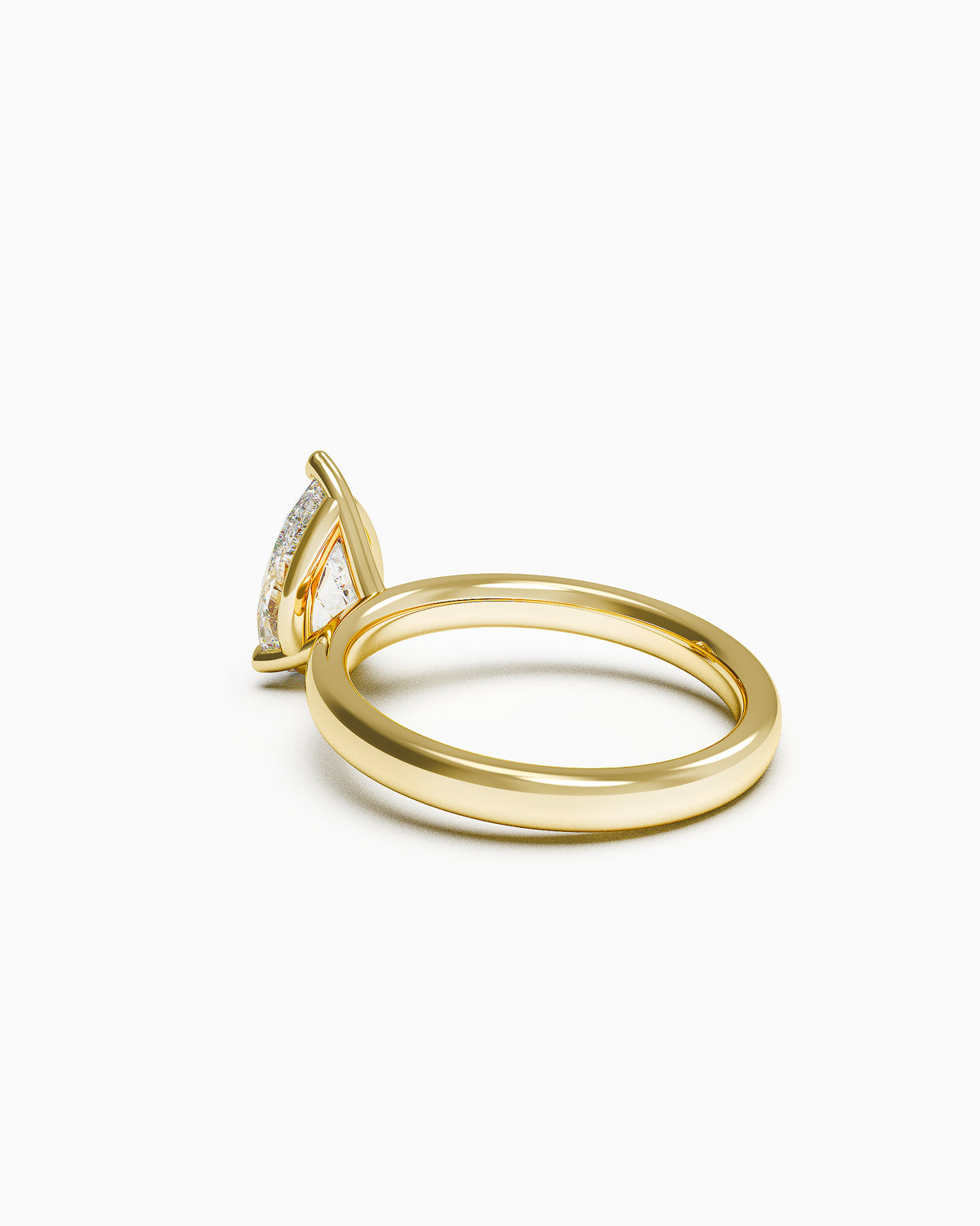 Side profile of a pear-shaped diamond ring with three-prong setting, showing the soft taper of the band.
