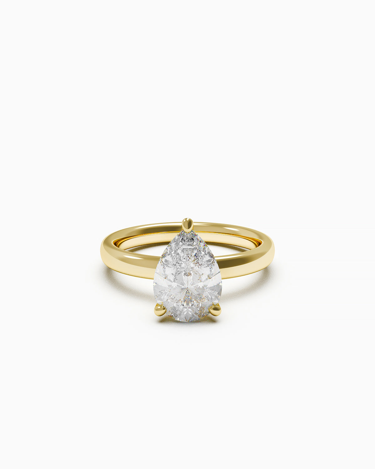 Pear-shaped diamond solitaire ring in a three-claw setting, available in yellow or white gold, front view on white background.