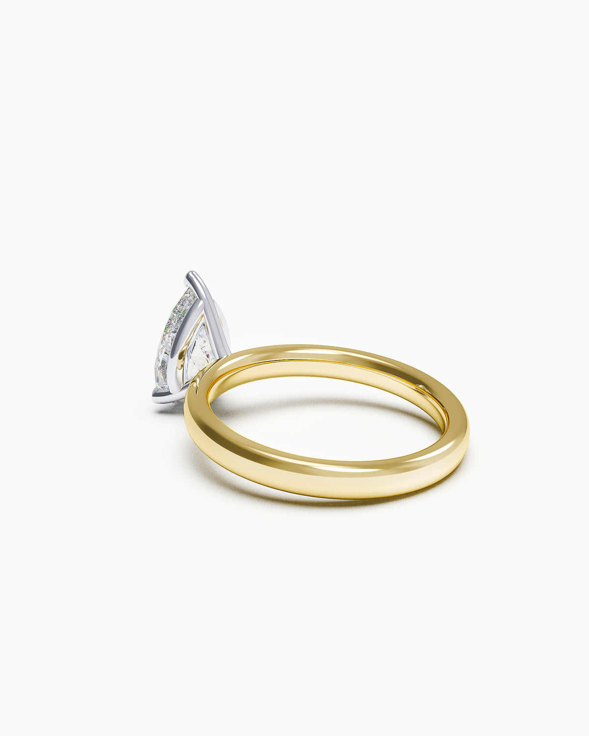 Side profile of a pear-shaped diamond ring with three-prong setting, showing the soft taper of the band.