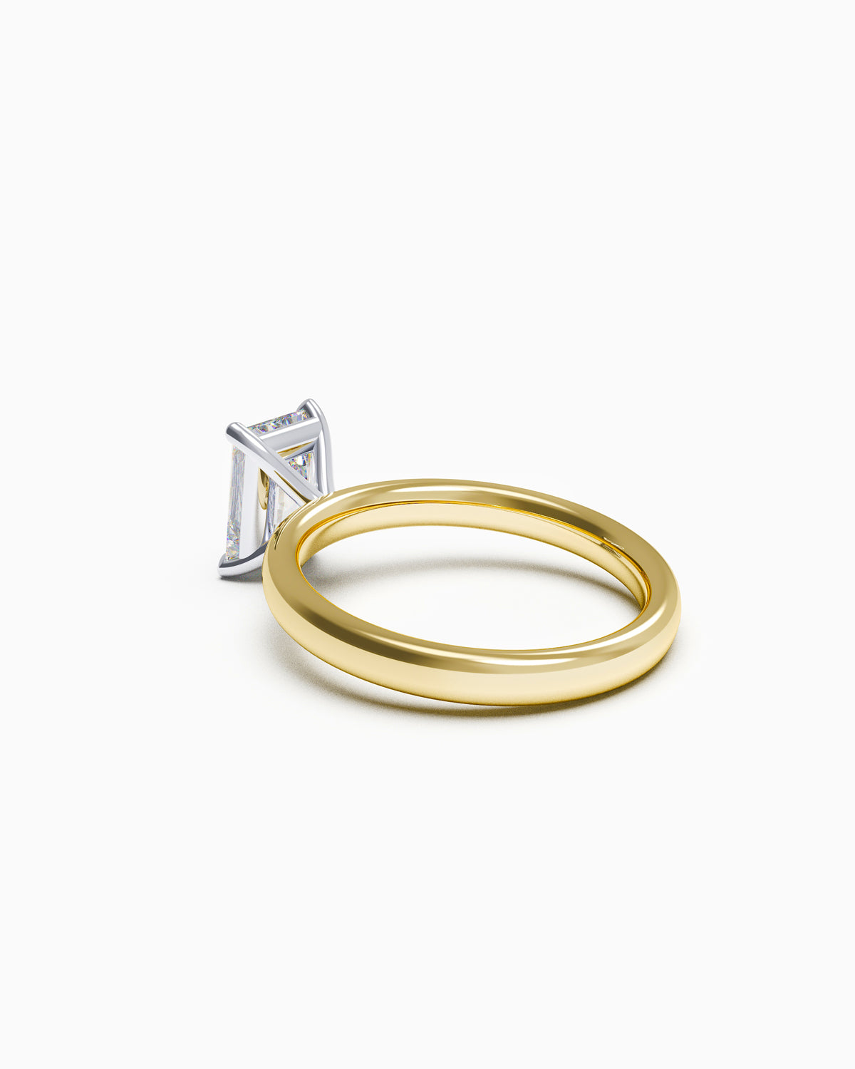 side view of a radiant-cut diamond solitaire engagement ring in a four-claw setting, available in yellow or white gold, photographed on a white background.