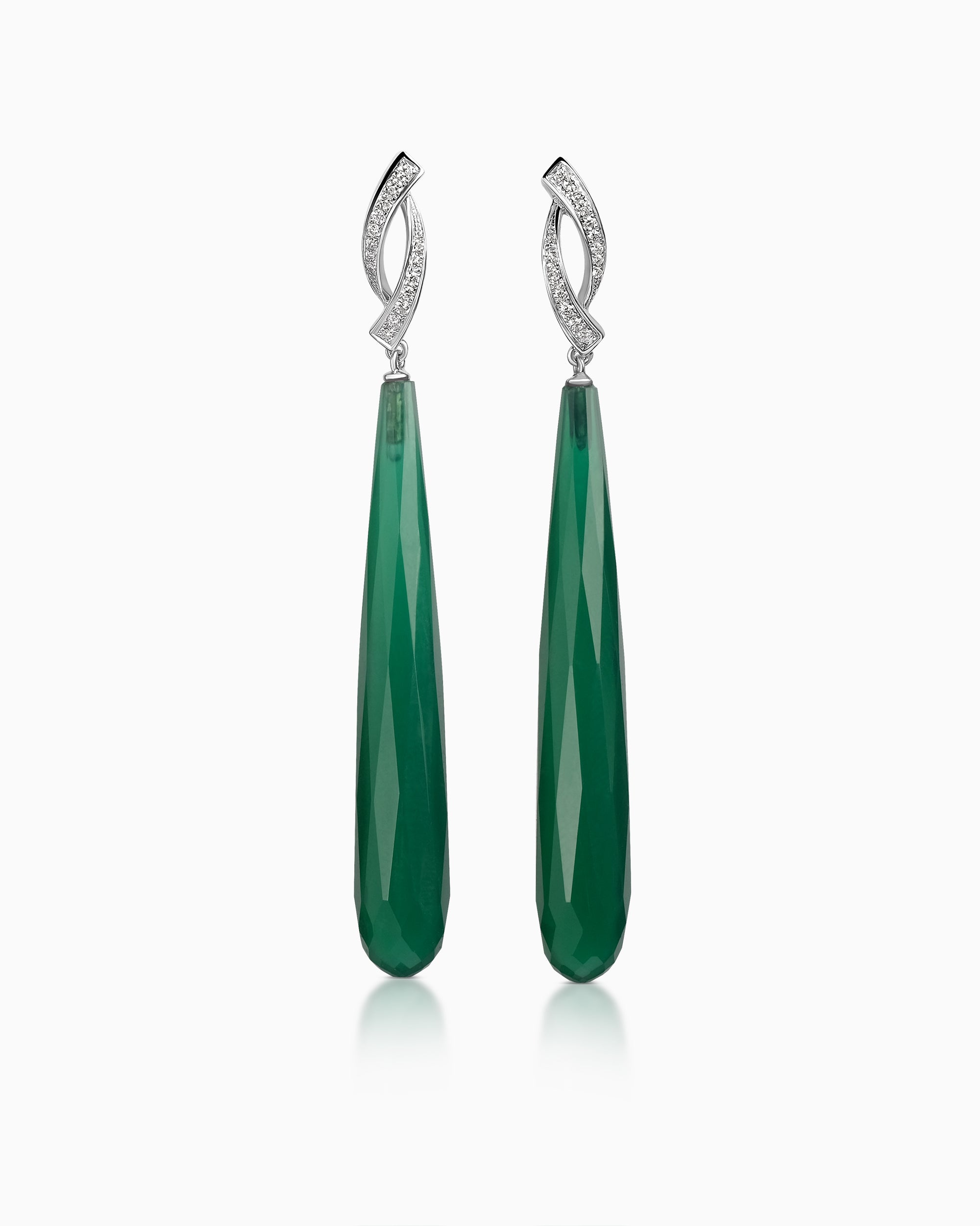 Pair of long green onyx drop earrings with faceted teardrop-shaped stones hanging from twisted diamond-studded 18k white gold studs.