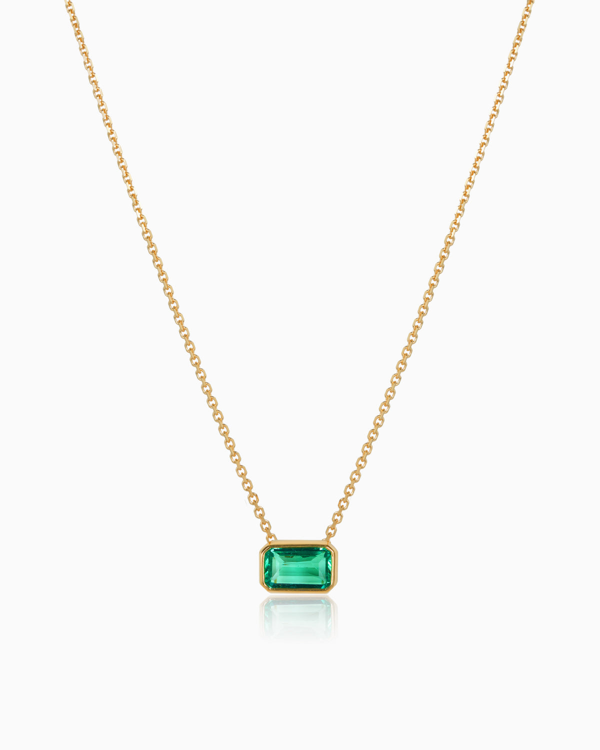 colombian emerald bezel set pendant crafted in 18kyg