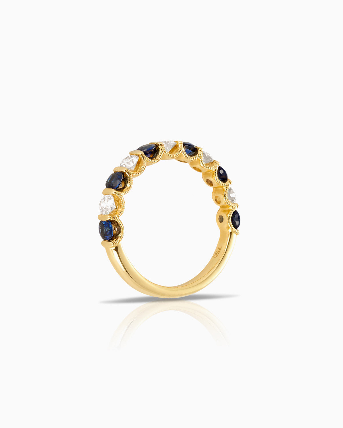 sapphire diamond and 18k yellow gold milgrain wedding band side view