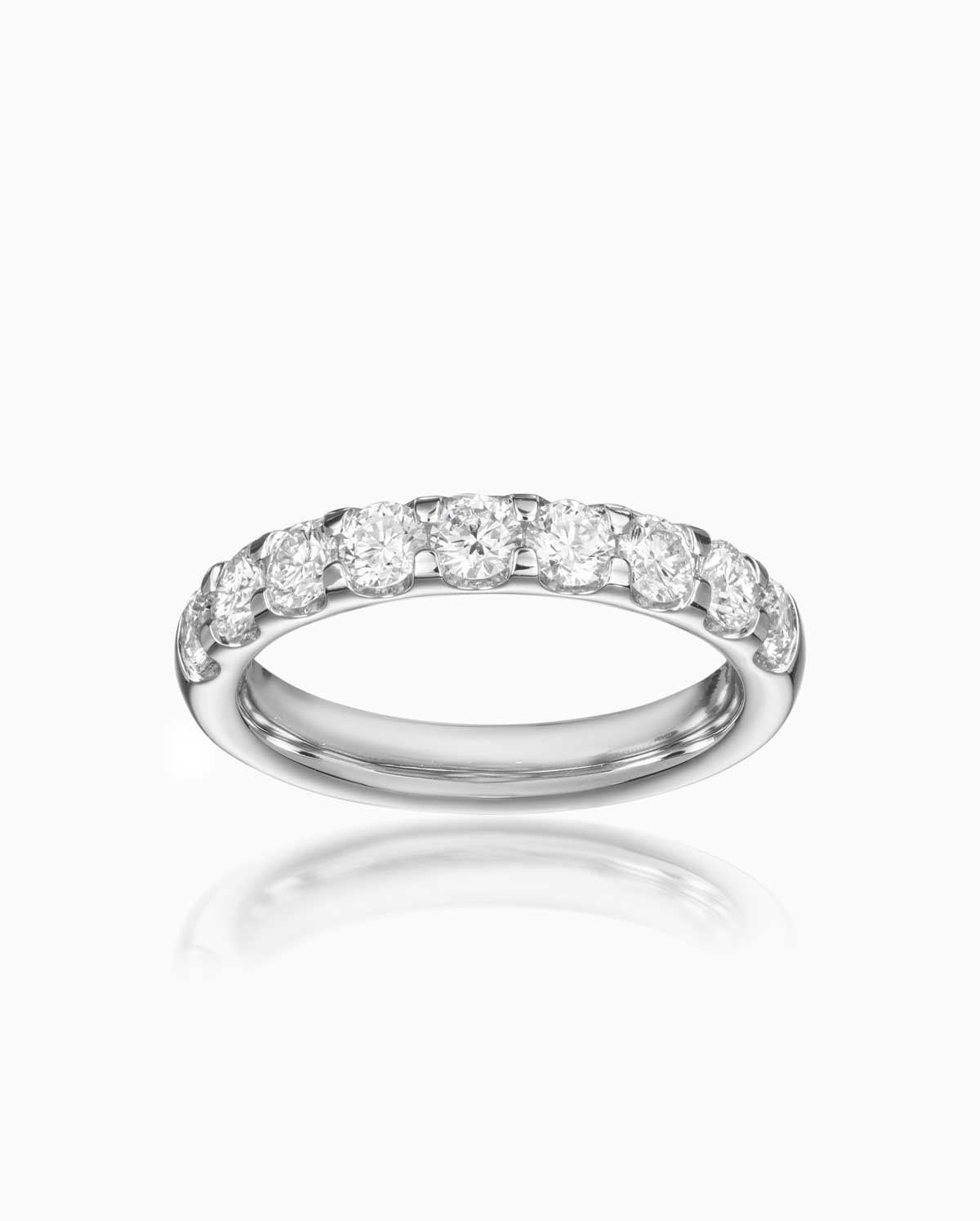 Quintessential 9 stone diamond band featuring platinum alloy by claude and me jewellery.