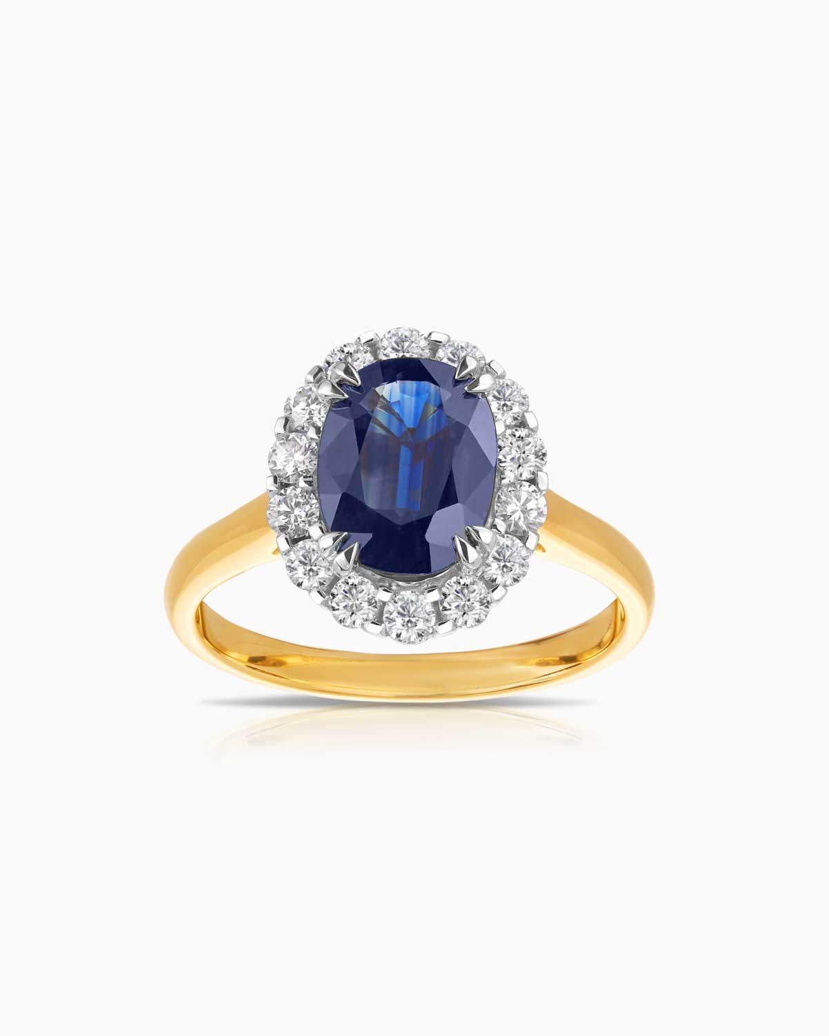 The 'Diana' 2.40ct Sapphire Ring features 18k yellow/white gold, a single halo of white diamonds and a white gold decorative underail.