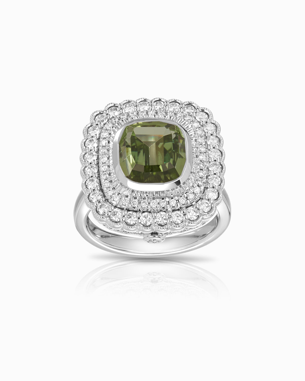 18k white gold ring with a cushion-cut mint quartz, framed by triple pavé diamond halos and a finely detailed openwork gallery.