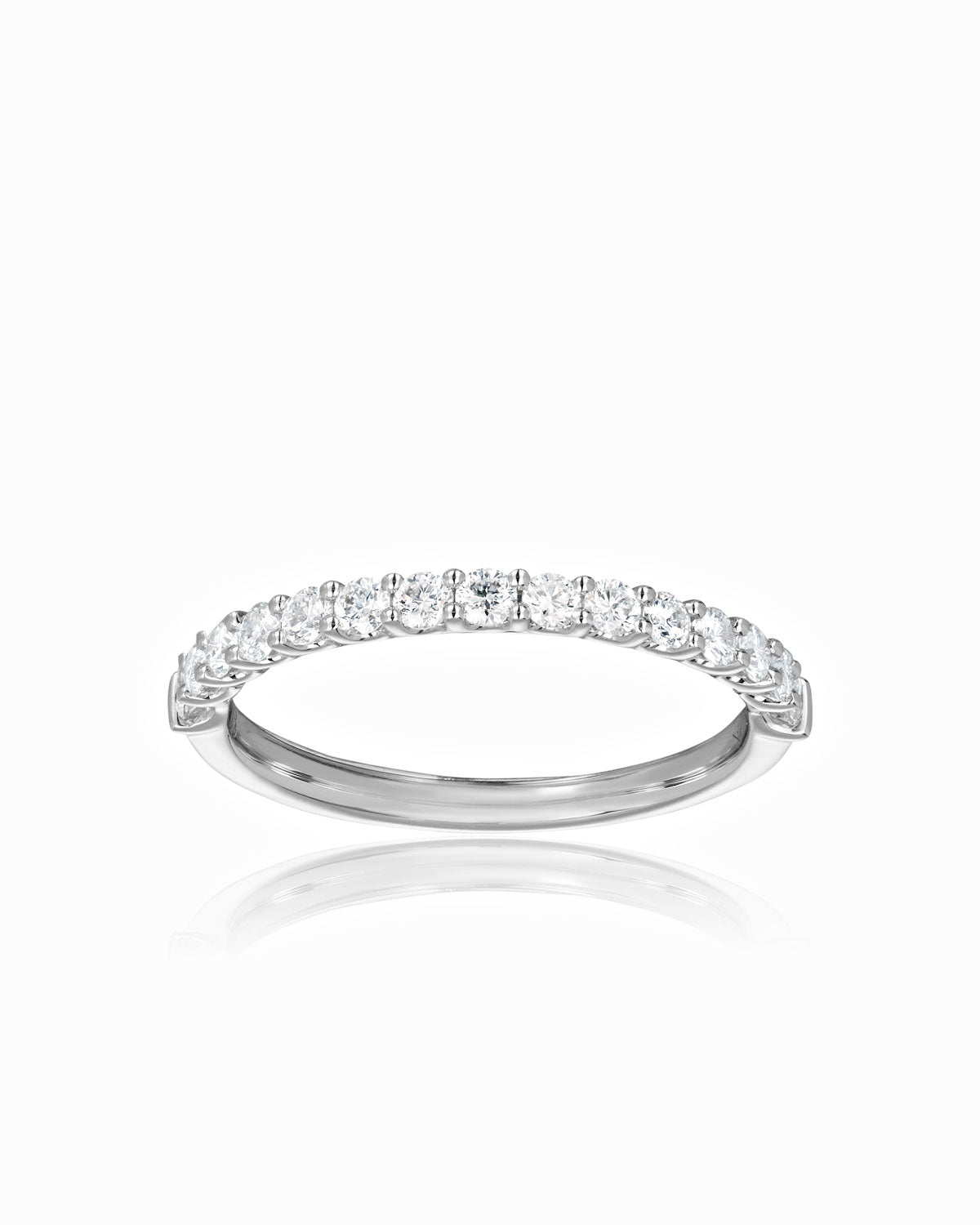 18k white gold diamond band with 0.43ct round brilliant diamonds in a delicate prong setting, part of the Signature Wedding Band Collection.