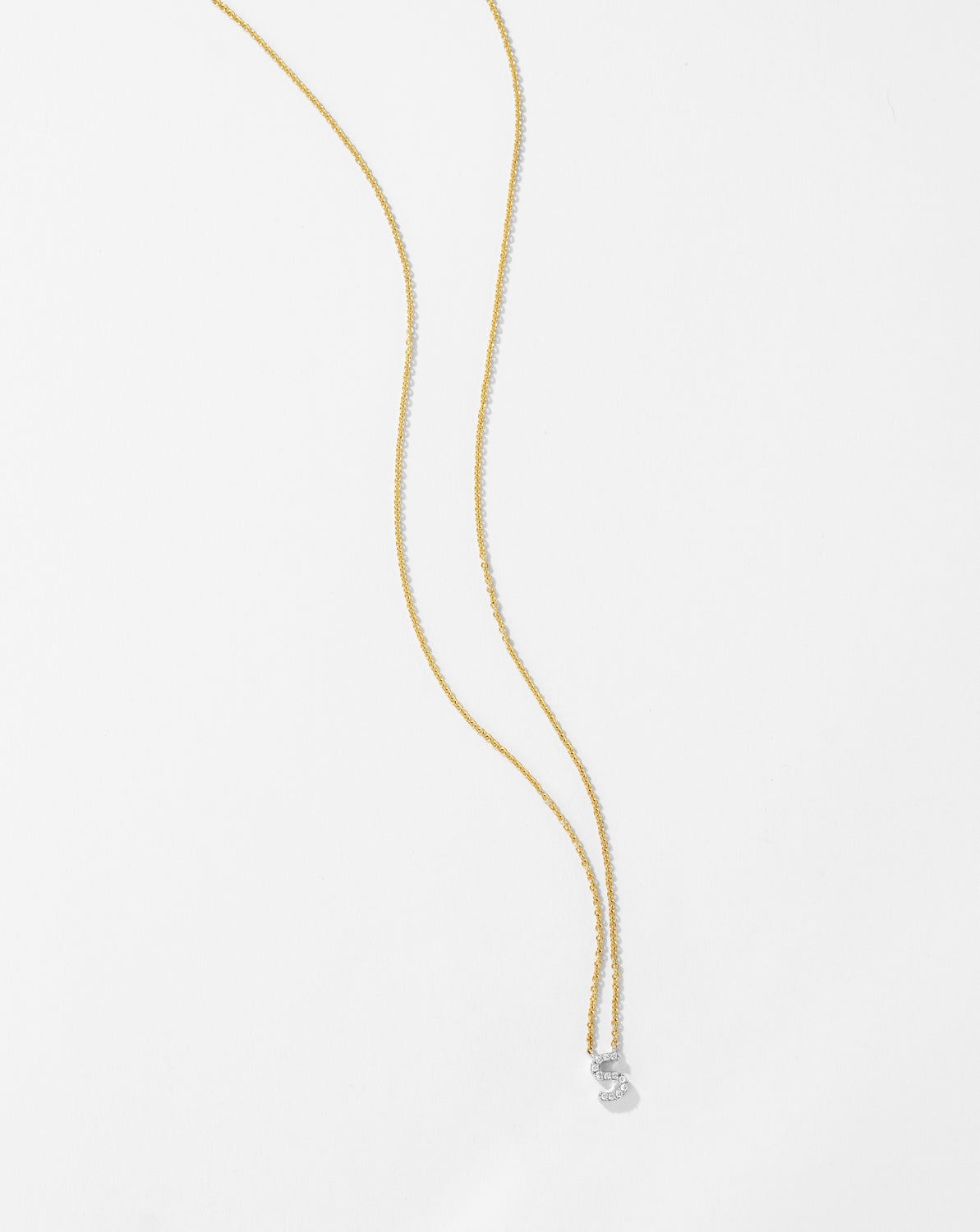 18k yellow gold diamond letter necklace with pavé-set FG/SI diamonds (0.05ct), from the Classic Collection.