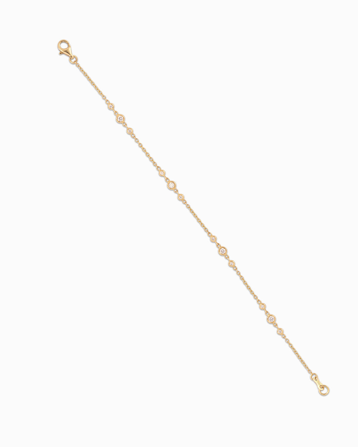 Diamond by the yard bracelet in 18k yellow gold with 0.36ct total round brilliant diamonds. Dainty and elegant design.