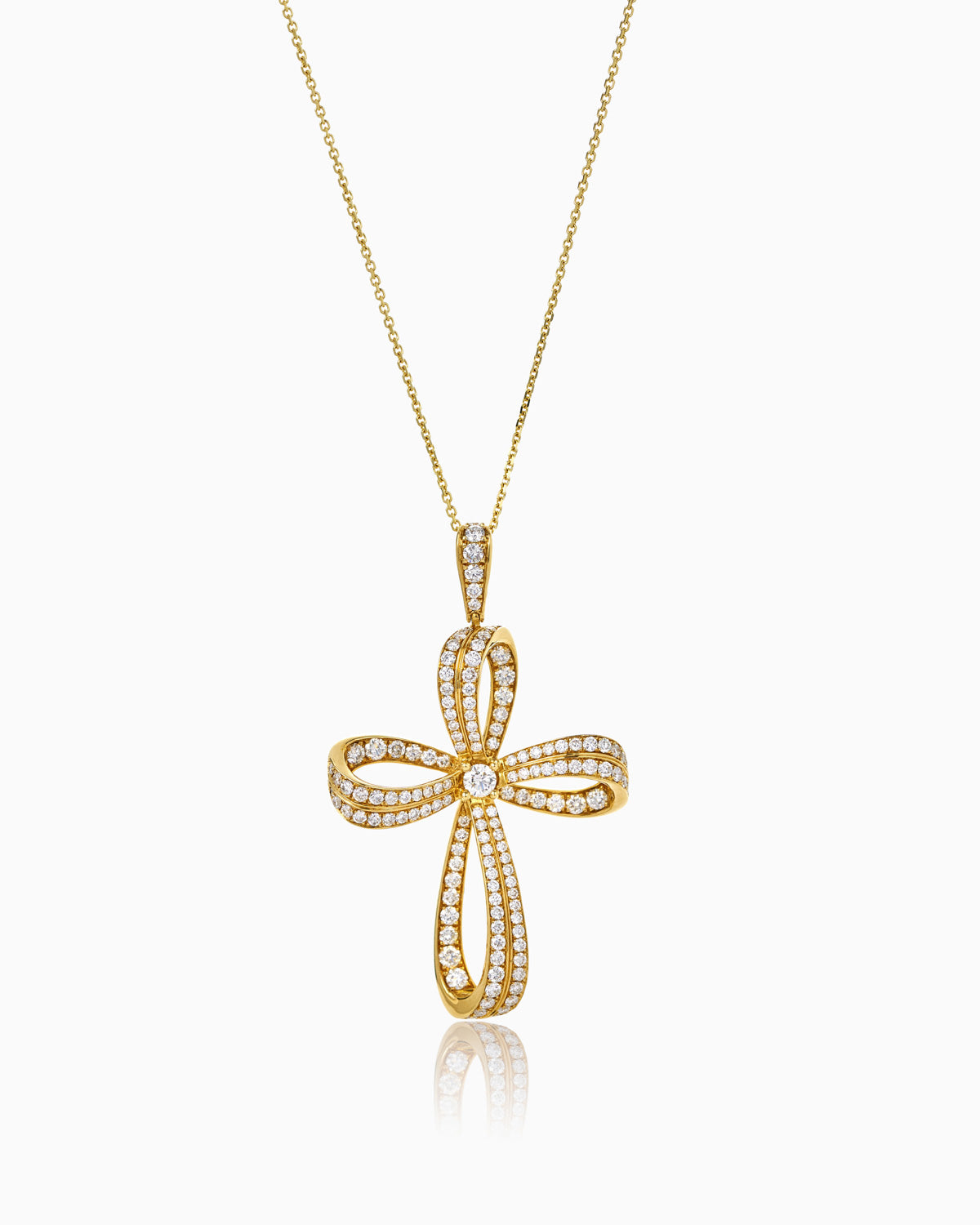 18k yellow gold diamond bow tie cross pendant