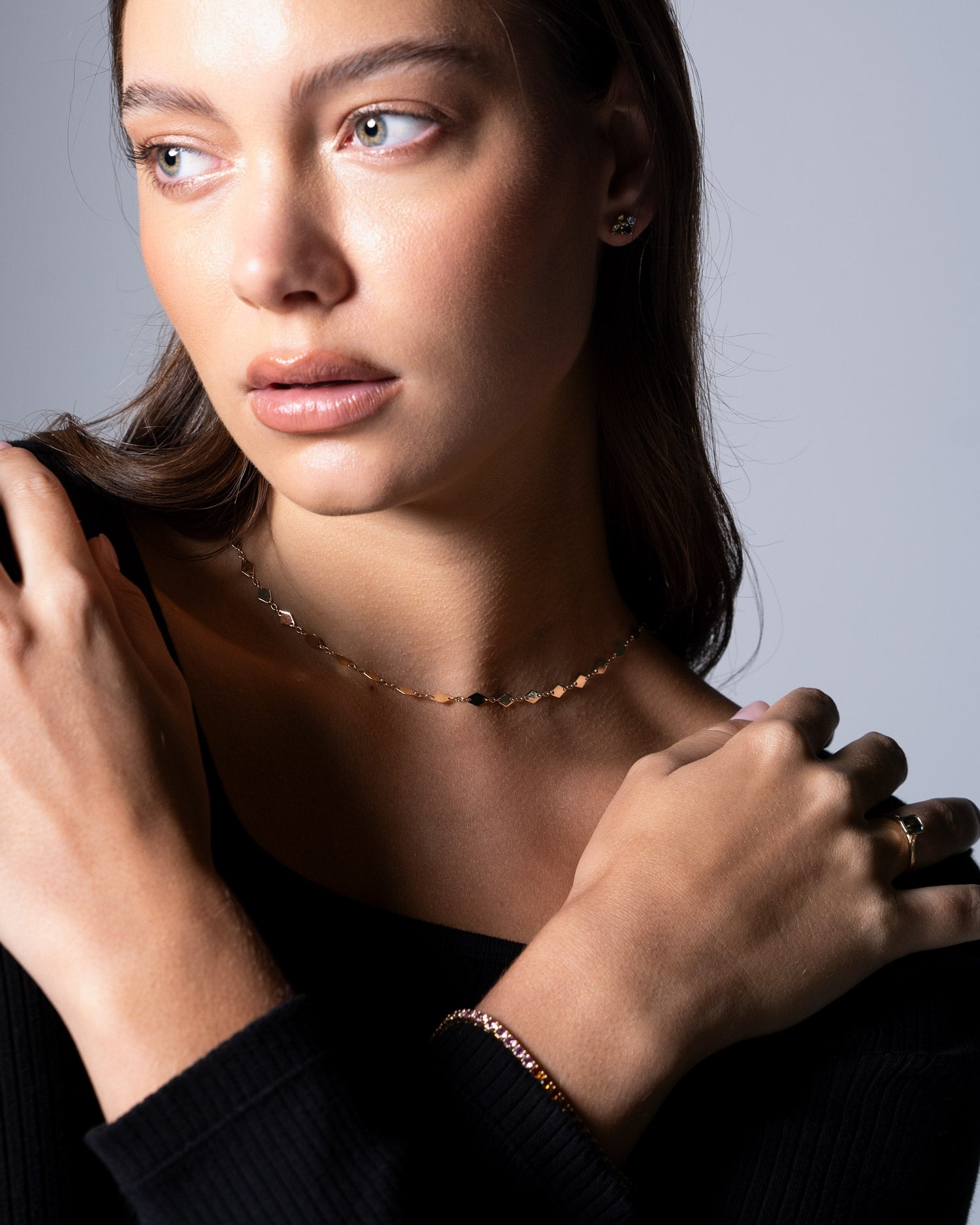 solid 9 karat yellow gold kite necklace worn by Ellie Brinkman for the claude and me Sapphire Brilliance collection.