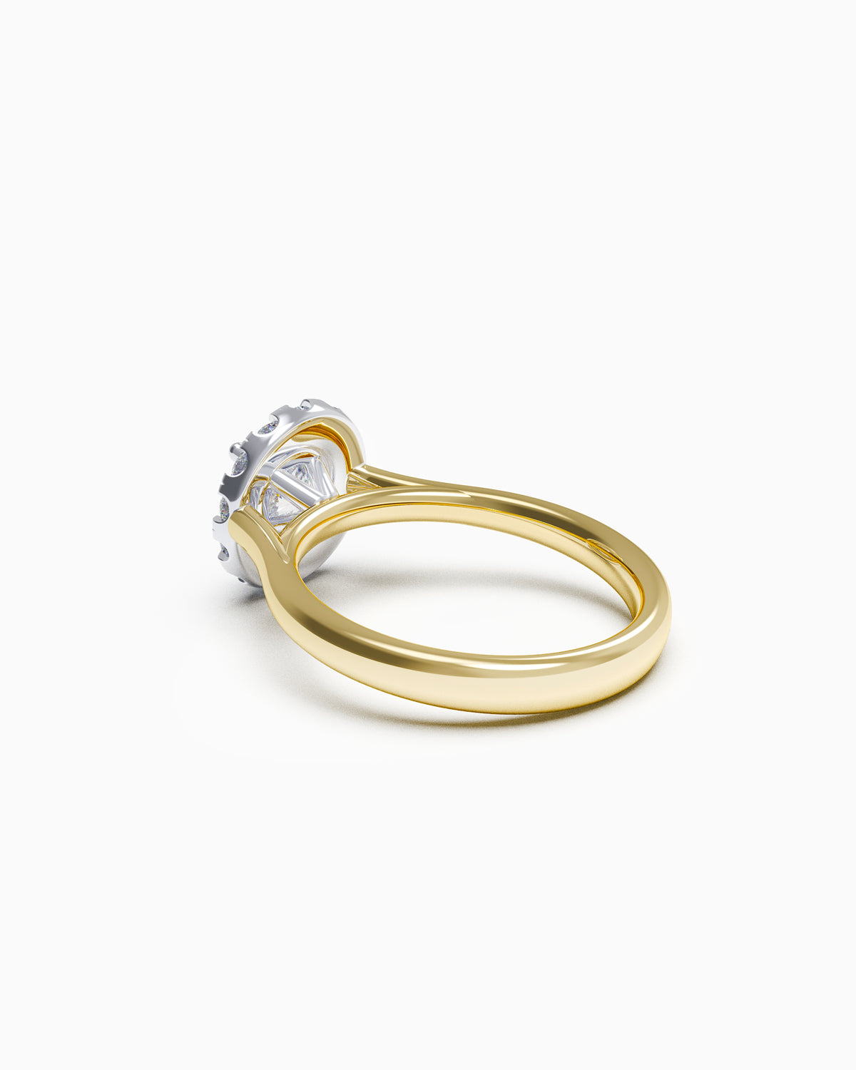 Side view of a round halo diamond ring with a slim polished band and raised claw-set centre stone, available in all 18k gold colours.