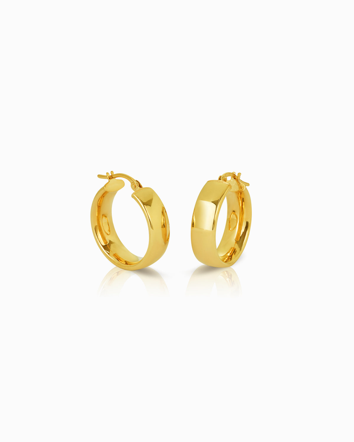 Polished 9k yellow gold hoop earrings (15x6mm) with a smooth, rounded finish, from the playful Claude by Claudia collection.