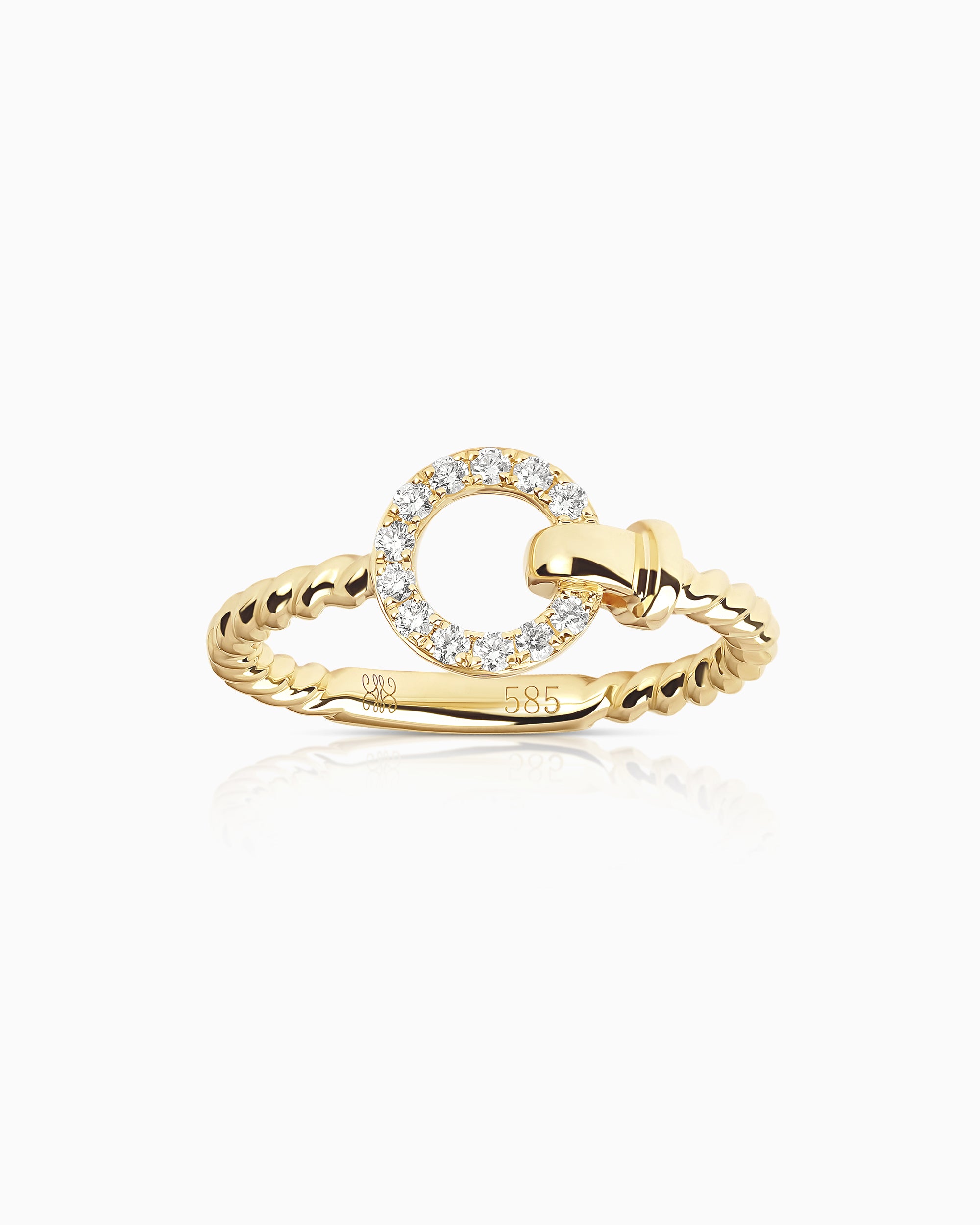 14k yellow gold twisted band ring with 0.14ct diamond-set clasp motif, equestrian-inspired from the Claude by Claudia collection.