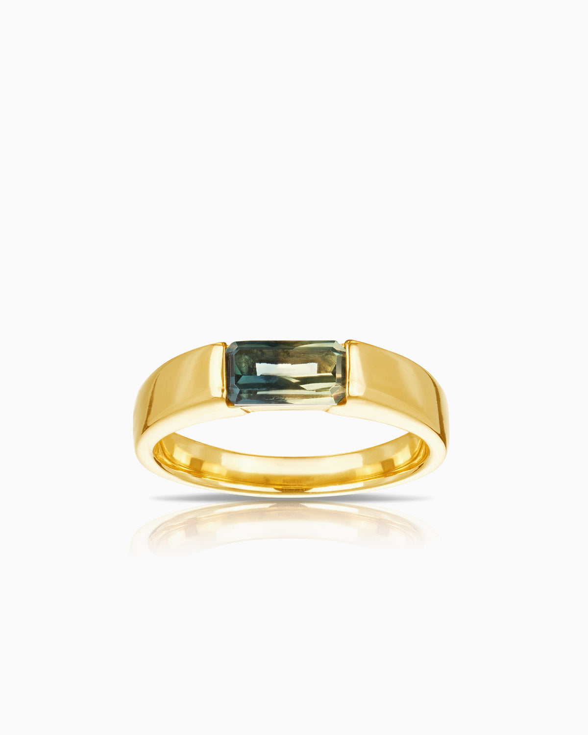 close up image of tension set australian sapphire ring featuring 18 karat yellow gold.