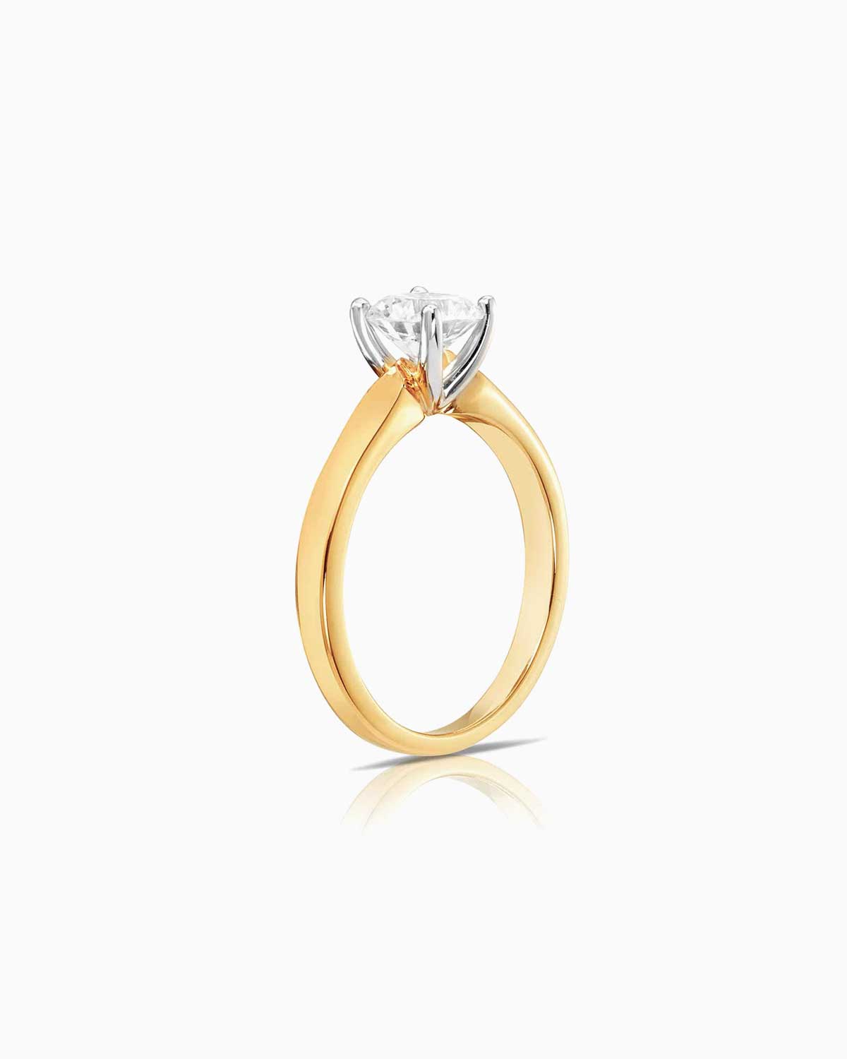 4 claw round diamond engagement ring in 18 karat yellow gold by claude and me jewellery