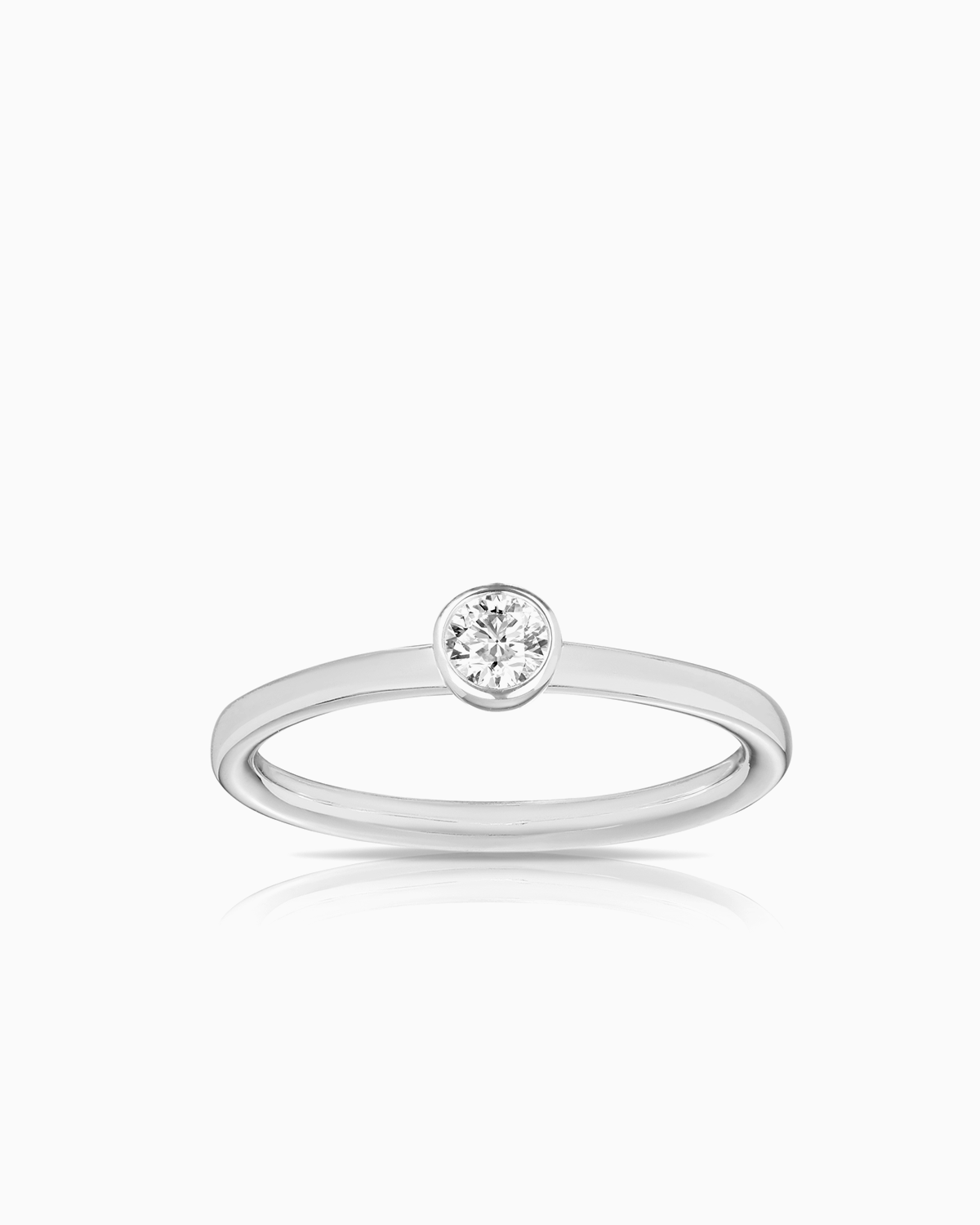 18 karat white gold petit single diamond ring by claude and me jewellery