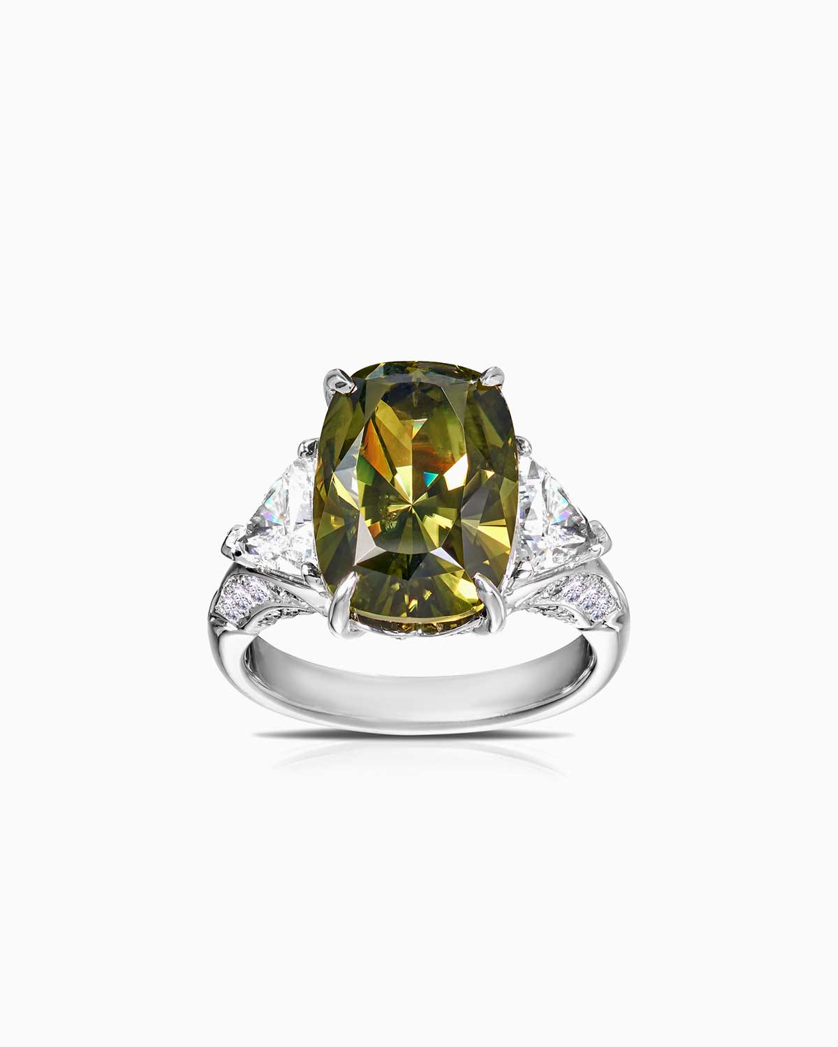 8.08ct Australian green sapphire trilogy featuring GIA certified triangle cut diamonds and set in 18 karat white gold by claude and me jewellery.