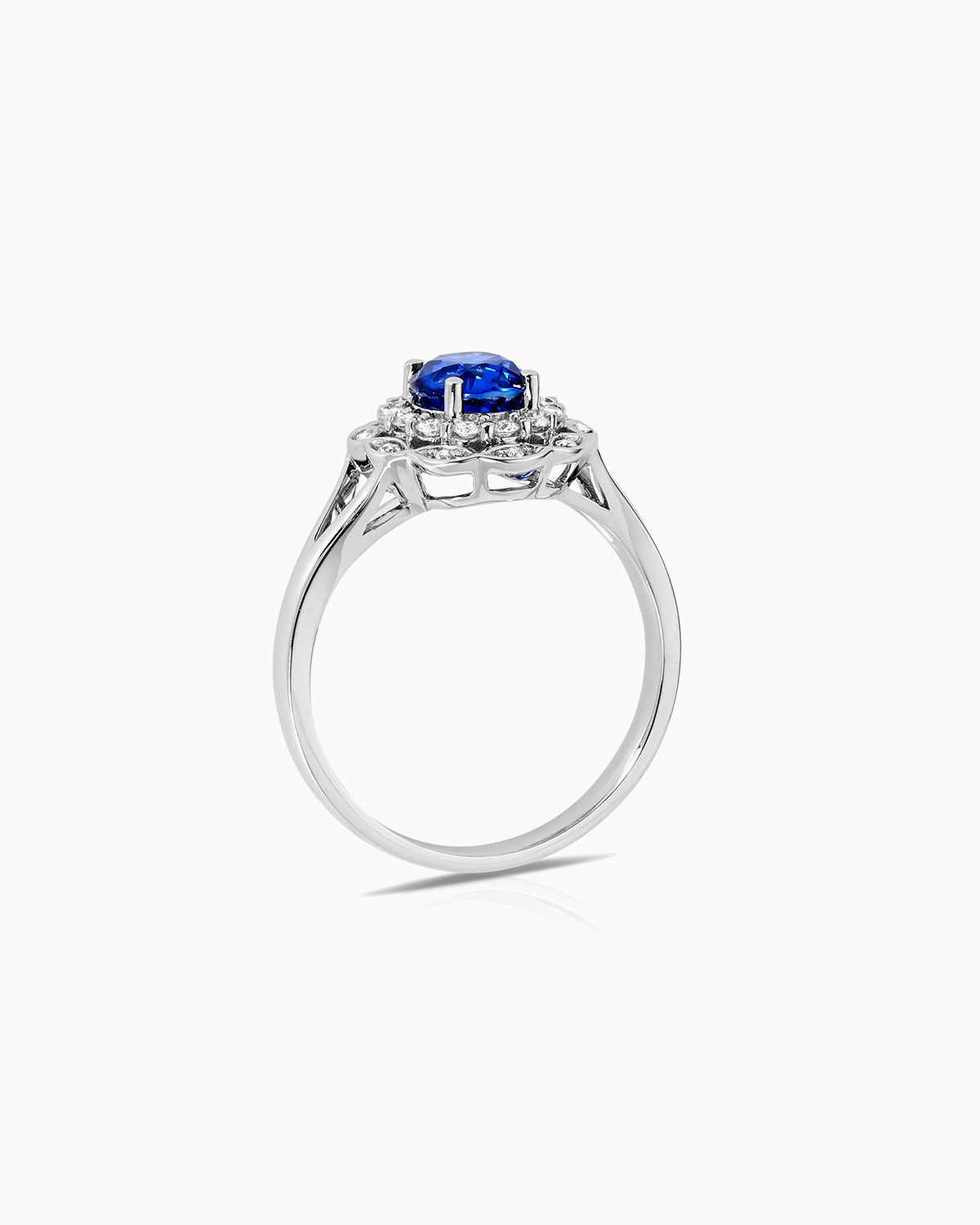 1.38ct Blue sapphire and diamond ring set in 18 karat white gold by claude and me jewellery.