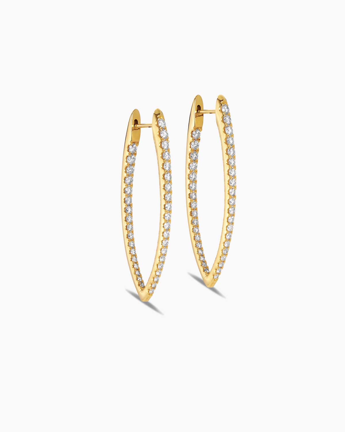 imperiale diamond hoops in 18 karat yellow gold by claude and me jewellery.