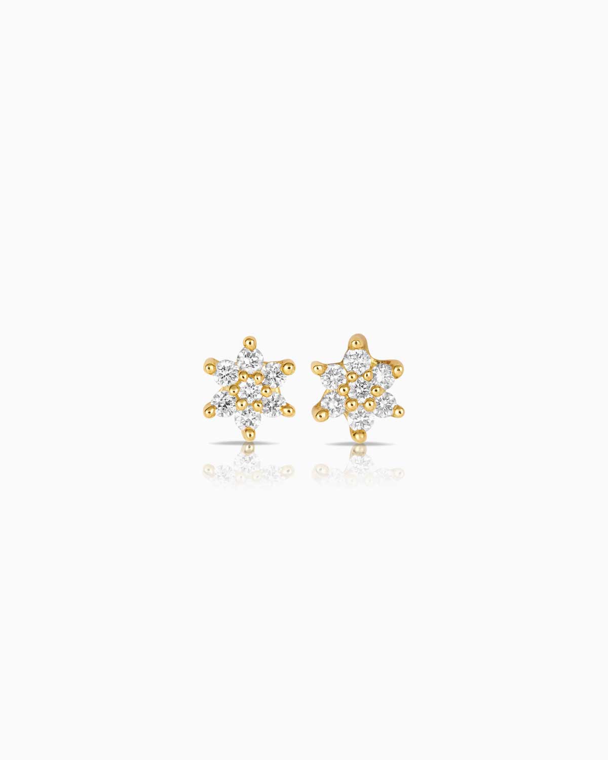 petit diamond star studs featuring 9 karat gold and 0.10ct of diamonds