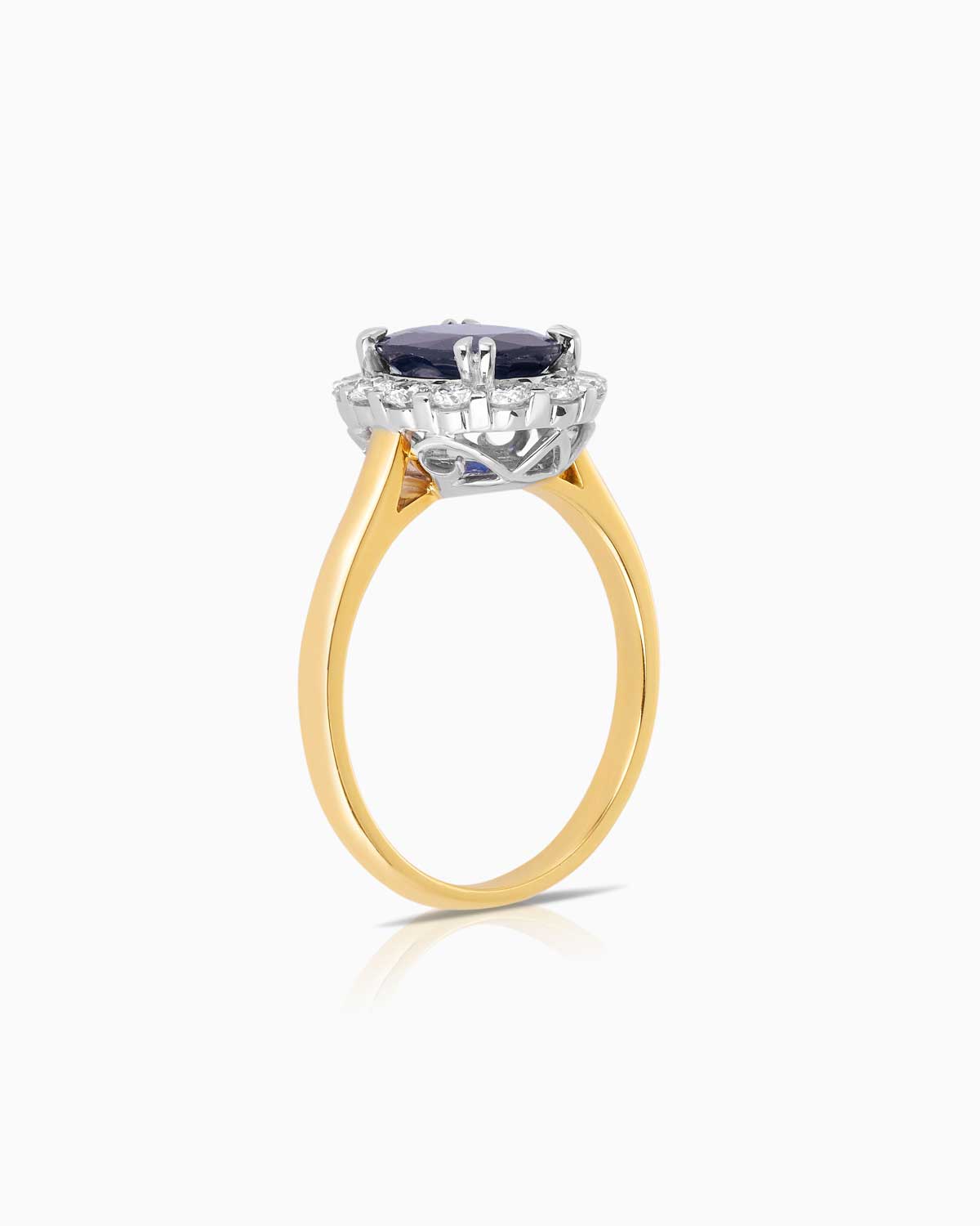 The 'Diana' 2.40ct Sapphire Ring features 18k yellow/white gold, a single halo of white diamonds and a white gold decorative underail.